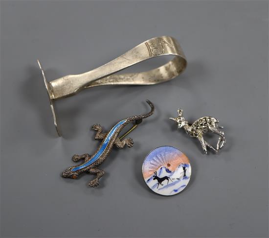 A silver pusher, enamelled white metal lizard brooch, Scandinavian 925S and enamelled brooch and marcasite deer brooch.